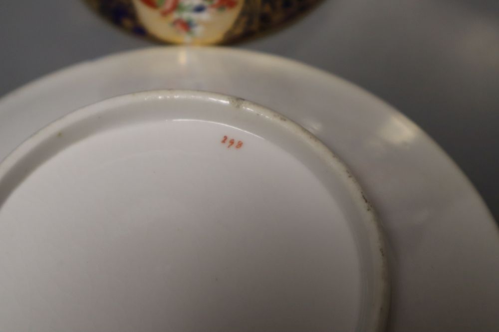 A Chamberlain Worcester cup and saucer in an imari style and a small cup and saucer in the same pattern, 15.5cm